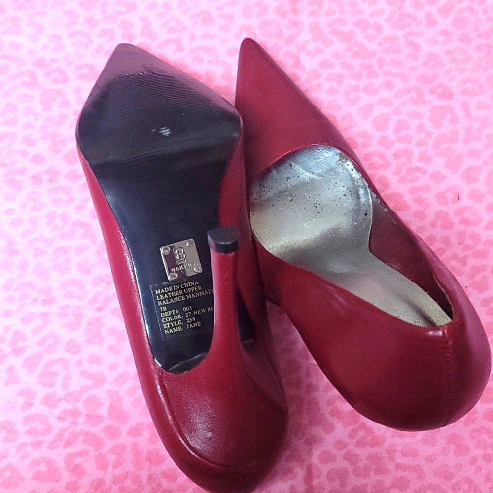 Maroon bakers pumps heels.  Worn outside still in wearable condition.